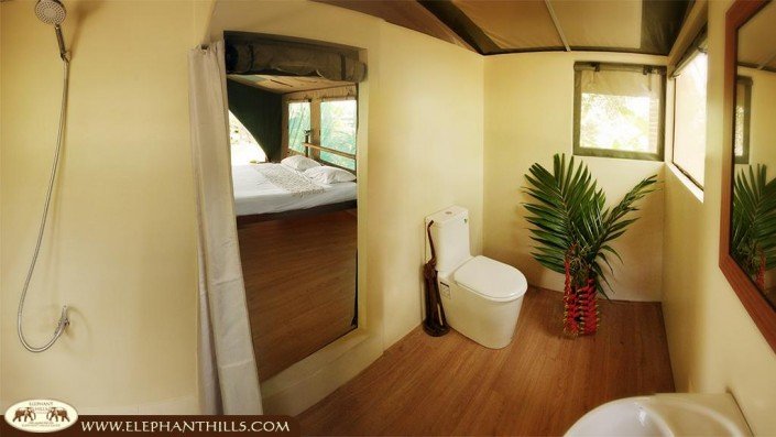 bathroom with westernstyle toilet and cold and hot shower