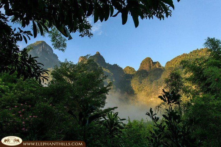 Surrounded by rainforest and Limestone Mountains