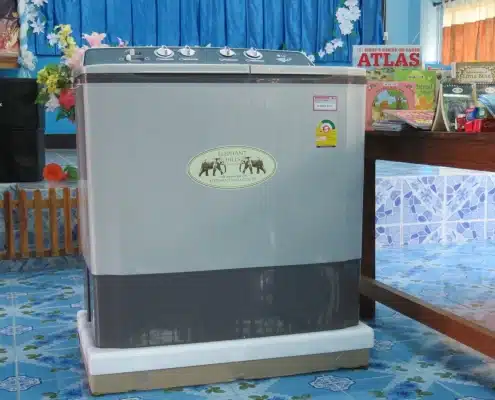 A new washing machine donated to student dormitory 21